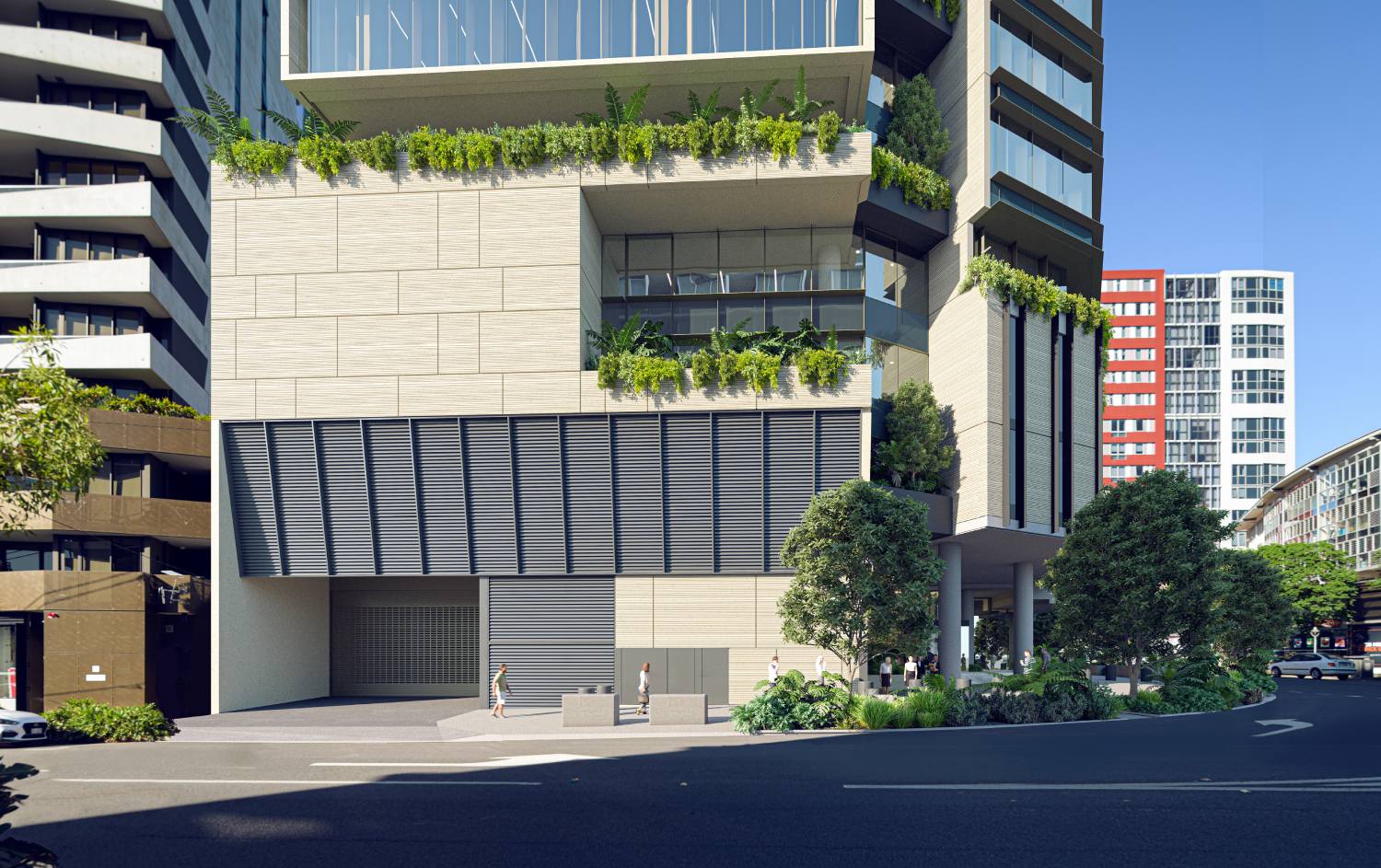 View of the 949 Ann Street tower from Ann Street showing the articulated facade with horizontal sun shading and cascading greenery